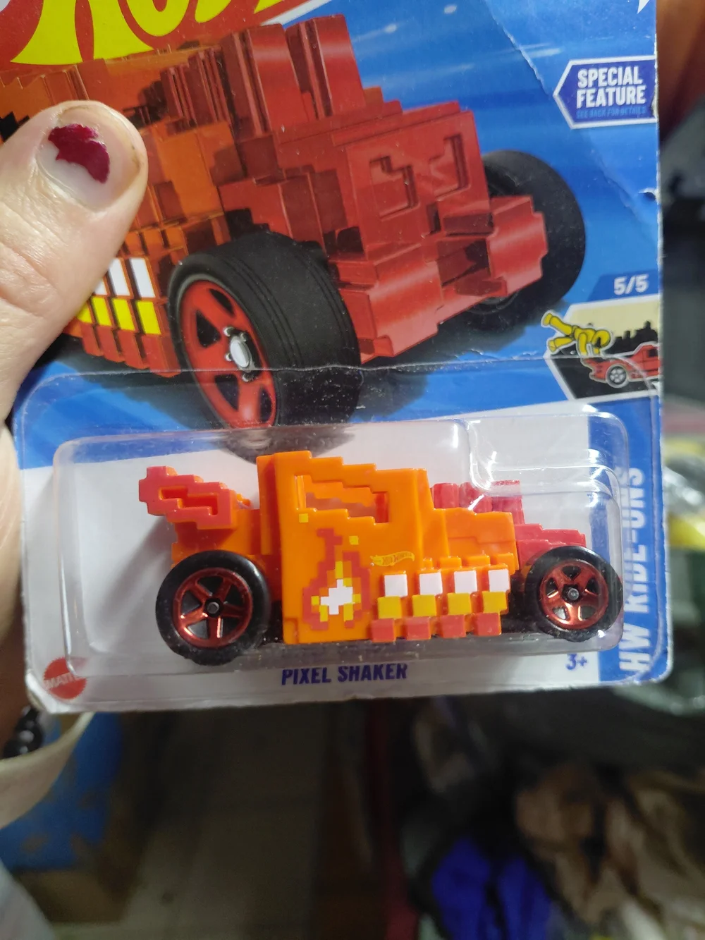orange Hot Wheels Pixel Shaker diecast car (collector number 138/250, HW Ride-On